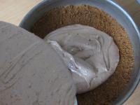Pour the chocolate filling into the cake mould on...