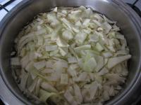 Chop the cabbage and cook it in salted water with...