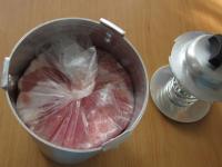 Close the pressed meat in a container of ham...