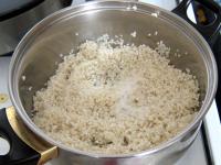 Put the rice on a strainer and wash it under...