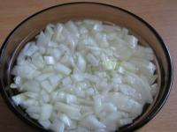 Peel an onion, slice it and put in a bowl. Pour...