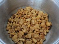 After removing of the lard, greaves remain in a...
