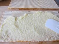 Place a pair of wafers on working board and spread...