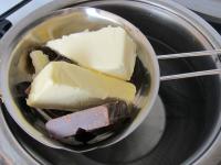Melt cooking chocolate with butter in a water bath...