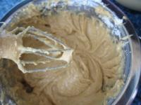Fold cooked egg whites foam into caramel pudding. ...