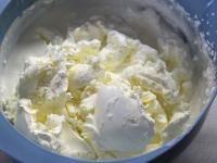 Prepare cream while the cakes are baking. Whisk...