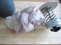 Remove cold ham from ham cooker and pour off water...