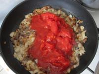 Cut sterilized tomatoes into small pieces and add...