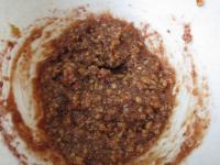 Chop walnuts and mix them with runny jam. ...