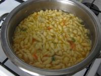 Cook the soup until dumplings swim up to the...