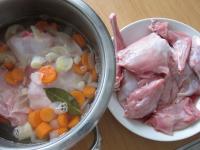 Put prepared rabbit meat into marinade and let it...
