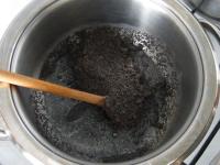 In a saucepan bring milk with sugar to a boil,...