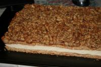 Spread the cream filling across the cake layer...