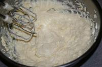 In a bowl blend together softened butter with...