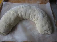 Roll the strudel to the parchment paper and shape...