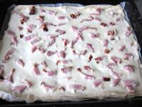 Transfer the flattened dough set on baking paper...