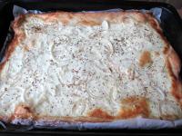 Bake flat bread in preheated oven until it becomes...