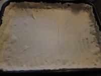 Use a rolling pin to spread puff pastry and place...