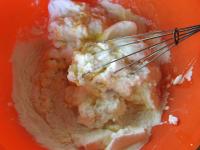 Mix flour and egg whites into the yolk mixture...