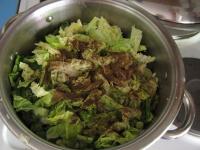 Place the cole into the pan with onion, salt and...