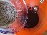 Chop the almonds finely in an electric chopper,...
