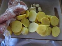 Peel potatoes, wash them and cut into rounds....