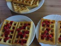 Pour the strawberry puree over the baked waffles...