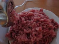 Wash the meat, cut and mince it....