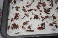Spread sour cream over the cold cake and after...