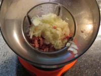 Peel onion, chop it and add to salami. ...