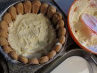 Layer more than third of cream over the biscuits. ...