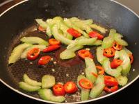 Cut the pepper and celery into slices. Fry in oil...