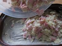 Grease the roasting dish with lard, sprinkle with...