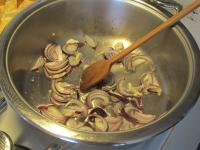 Fry chopped onion and garlic in oil....