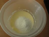 Mix acidified milk, milk, eggs and coconut in a...