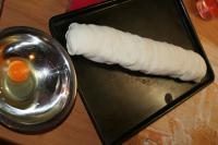 Roll pastry into the strudel, prick the surface...