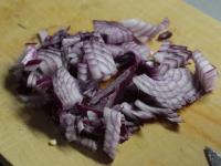 Clean red onion and cut it finely....