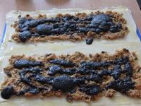 Spread apple filling on the breadcrumbs. Place...