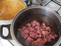 Place pot back to fire and cook the roux. Add...