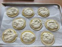 Place one tablespoon of filling in the centre of...