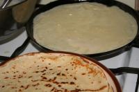 Make pancakes in a pan and grease it with oil or...