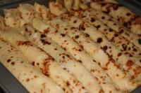 Place the pancakes on a smaller baking tin closely...