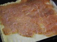 Peel apples and grate them coarsely. Gently...