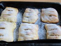 Sprinkle finished cakes with sifted powdered...