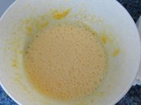 Beat egg yolks with sugar and water into foam. ...
