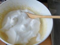 Gently fold egg whites foam into the mixture....