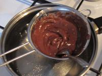 Melt the chocolate in a water bath. Put it into...
