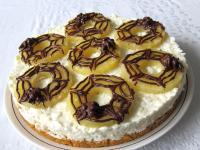 Place spider-web pineapples on the cake and leave...