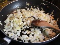 Clean and cut the onion. Heat the oil in a pan,...