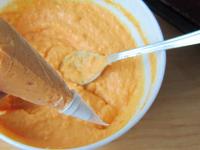 Put about four tablespoons of cream in a pastry...